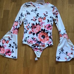 Brand new** floral bell sleeved body suit